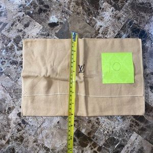 Vintage fold over dust bag Louis Vuitton.